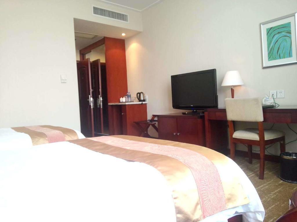 Century Hotel Taicang Quarto foto