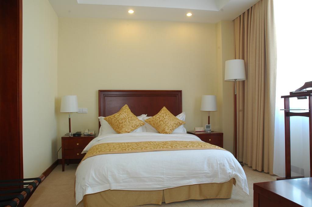 Century Hotel Taicang Quarto foto
