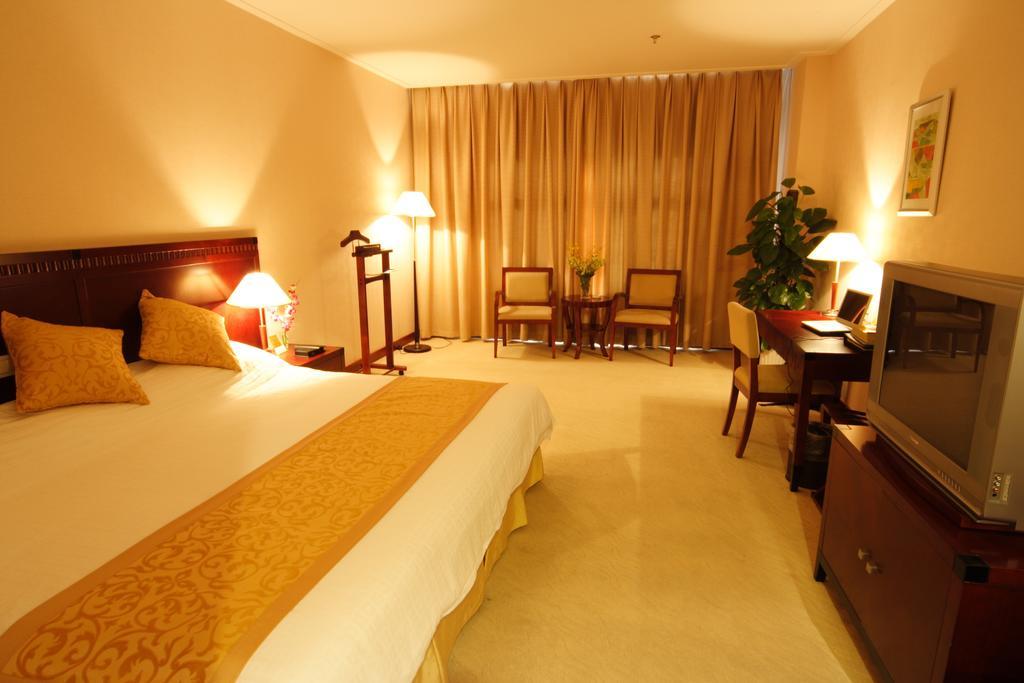 Century Hotel Taicang Quarto foto