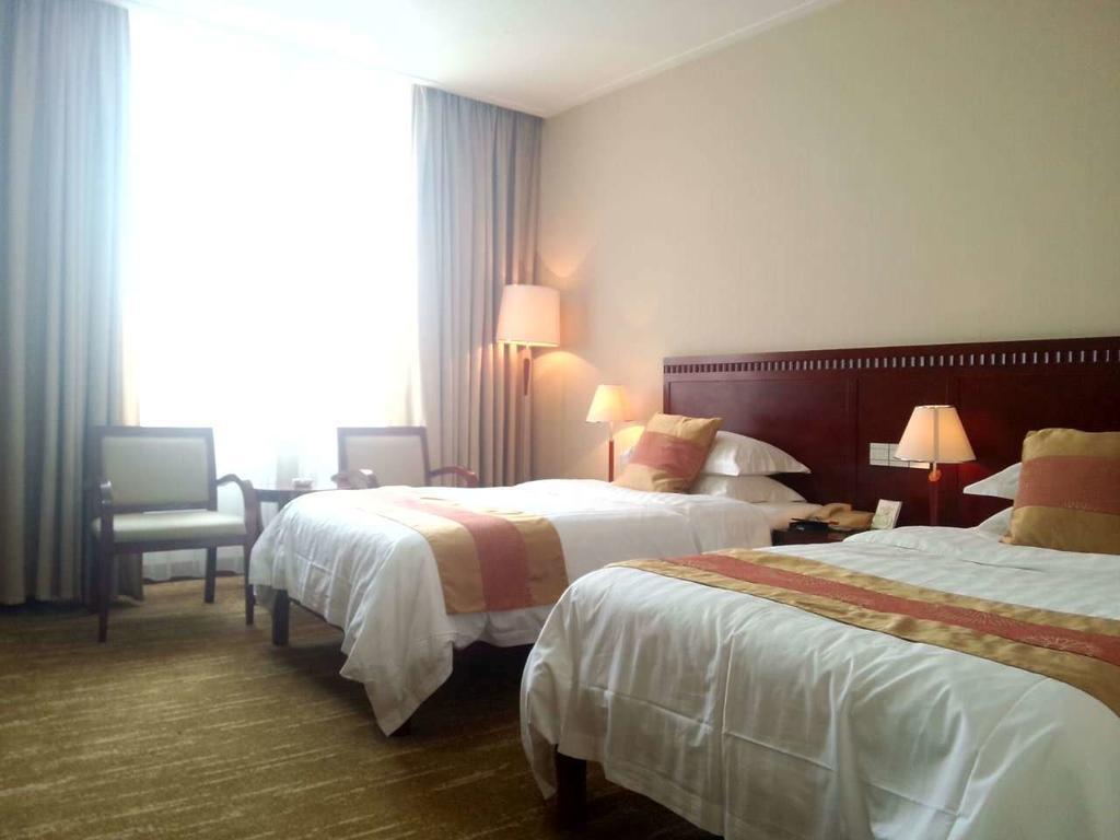 Century Hotel Taicang Quarto foto