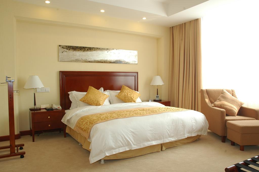 Century Hotel Taicang Quarto foto