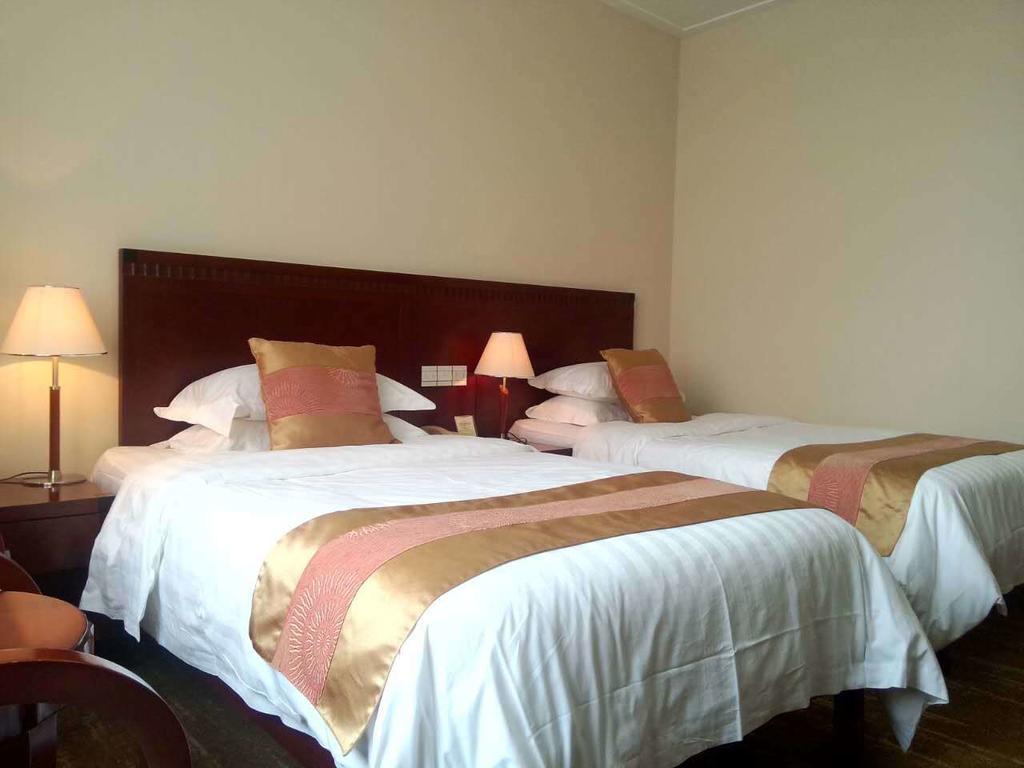 Century Hotel Taicang Quarto foto